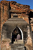 Old Bagan Myanmar. The Tharaba Gateway, shrine containing images of nats. 